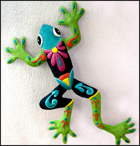 painted metal tropical frog wall hanging